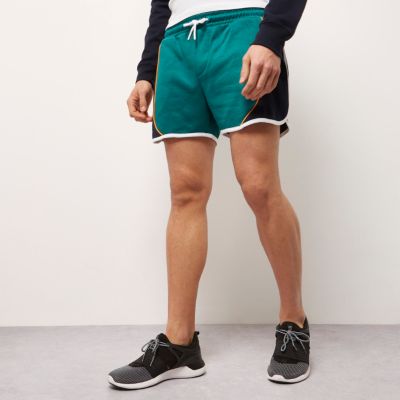 Green sporty runner shorts
